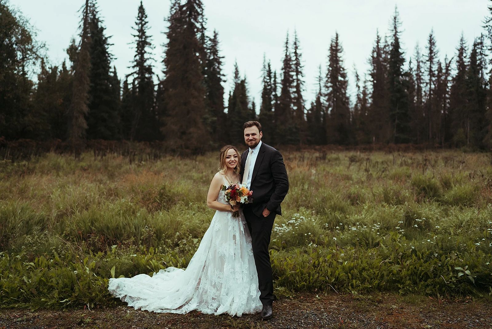 A couple embraces an Alaska adventure for their wedding at Cusack's on the Kenai.